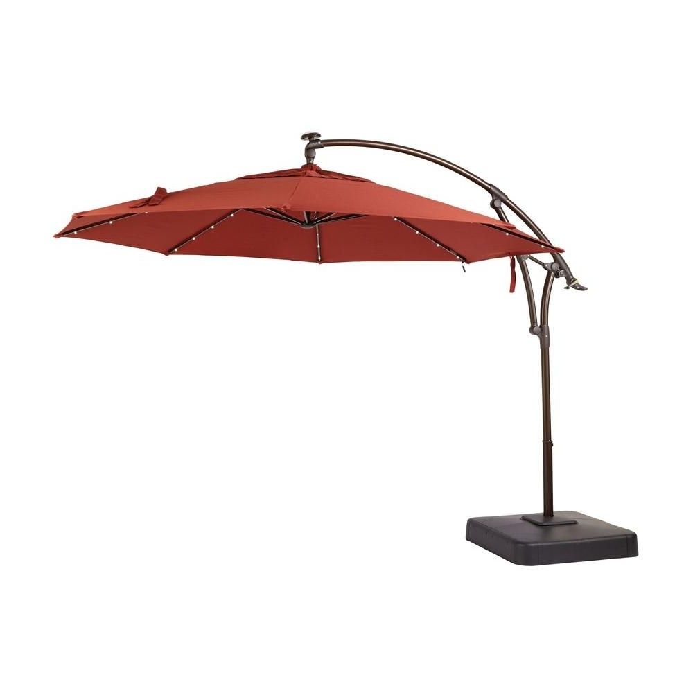 Hampton Bay 11 Ft. Led Offset Patio Umbrella In Sunbrella Henna With Trendy Sunbrella Patio Umbrella With Lights (Photo 1 of 20)