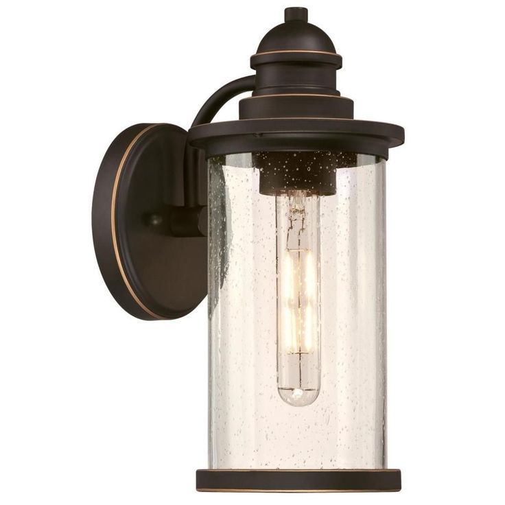 Best And Newest Westinghouse Vicksburg Medium 1 Light Oil Rubbed Bronze In Heinemann Rubbed Bronze Seeded Glass Outdoor Wall Lanterns (View 10 of 20)