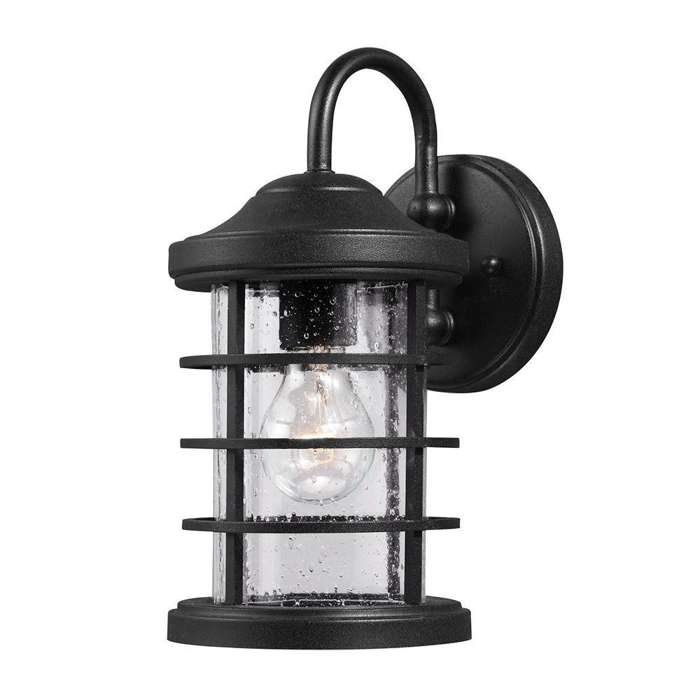 Current Sea Gull Lighting Sauganash 1 Light Outdoor Black Wall Pertaining To Chelston Seeded Glass Outdoor Wall Lanterns (View 14 of 20)
