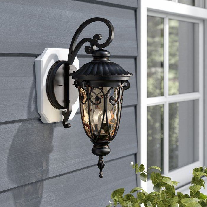 Jordy Oil Rubbed Bronze Outdoor Wall Lanterns With Trendy Erickson Oil Rubbed Bronze Hammered Glass Outdoor Wall (View 15 of 20)