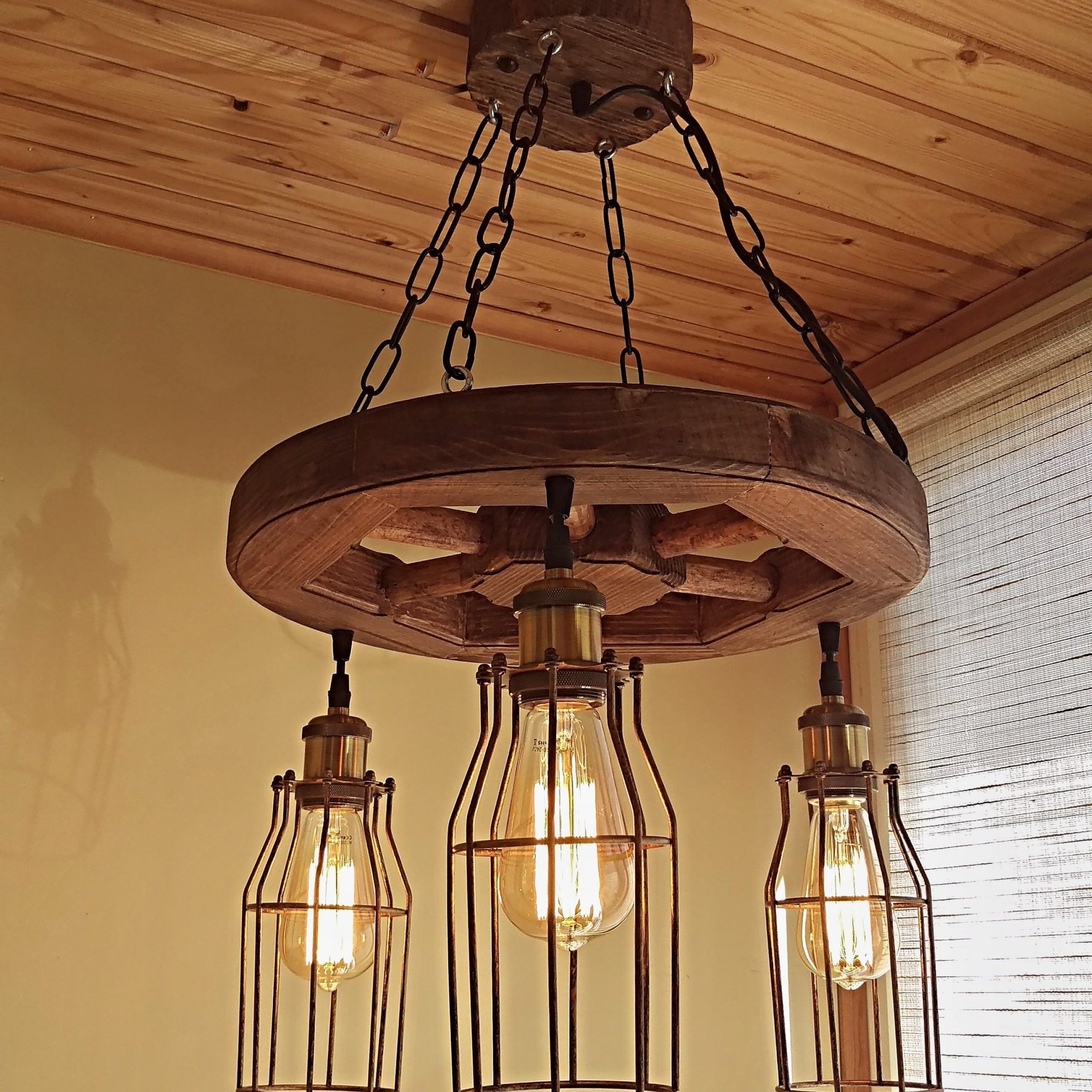 Famous Wood Wagon Wheel Chandelier With Wagon Wheel Chandeliers (View 3 of 20)