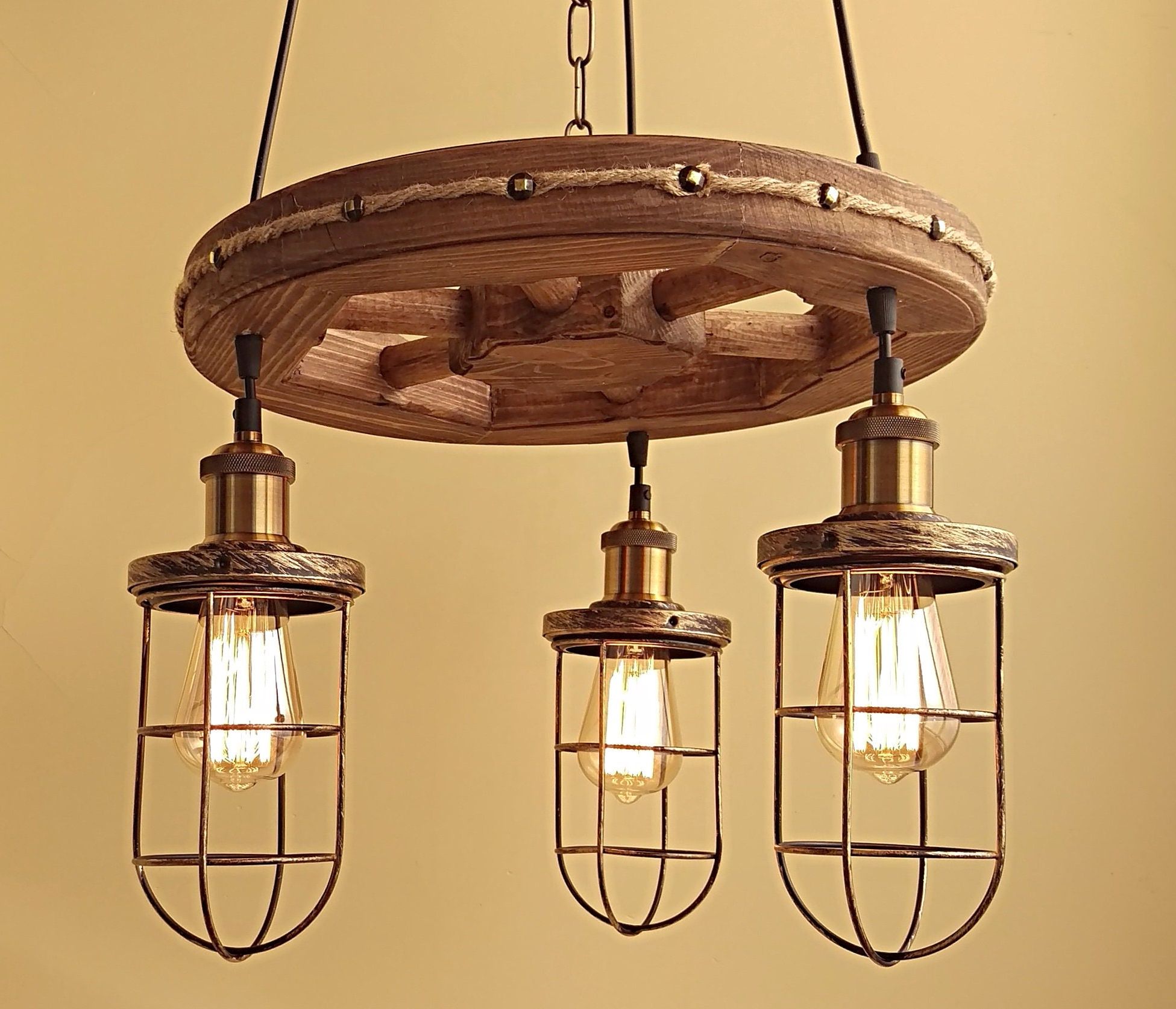 Wagon Wheel Chandeliers Throughout Most Recent Handmade Rustic Wood Wagon Wheel Chandelier (View 6 of 20)