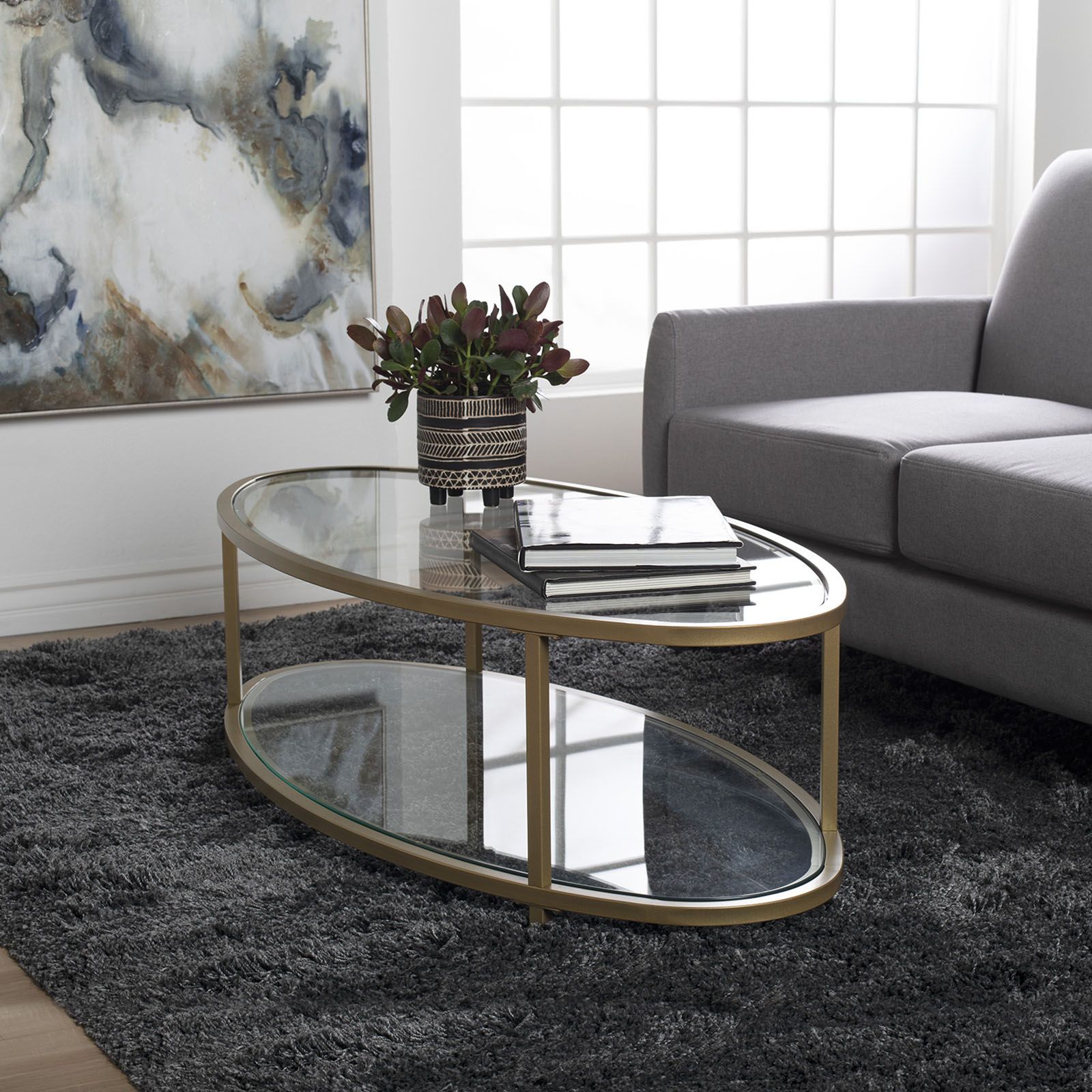 Glass And Pewter Oval Coffee Tables Intended For Fashionable Camber Modern Oval Coffee Table (48″ W) In Gold/clear (View 4 of 20)