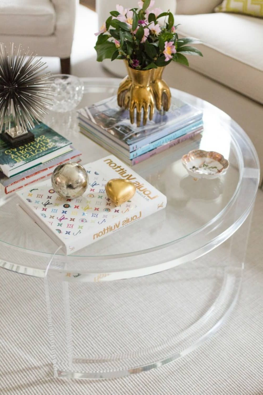 Most Recent Clear Acrylic Coffee Tables Within Styling Tricks For Round Coffee Tables (View 9 of 20)