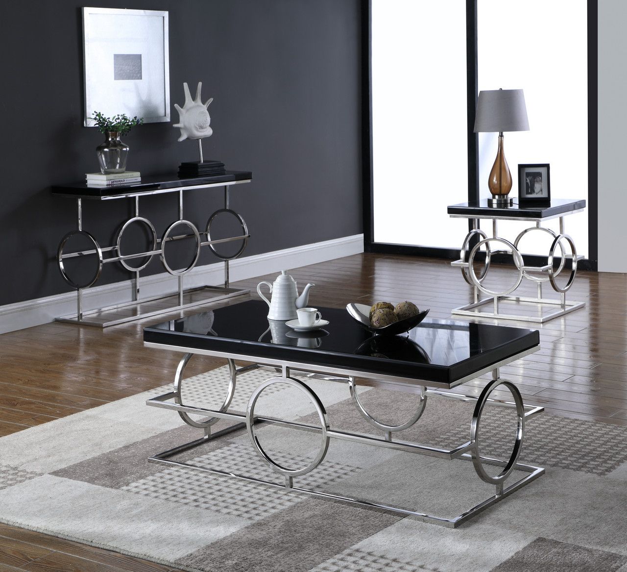 Silver Stainless Steel Coffee Tables Within Latest Cesario Modern Black Glass Top Coffee Table W/shaped (View 5 of 20)