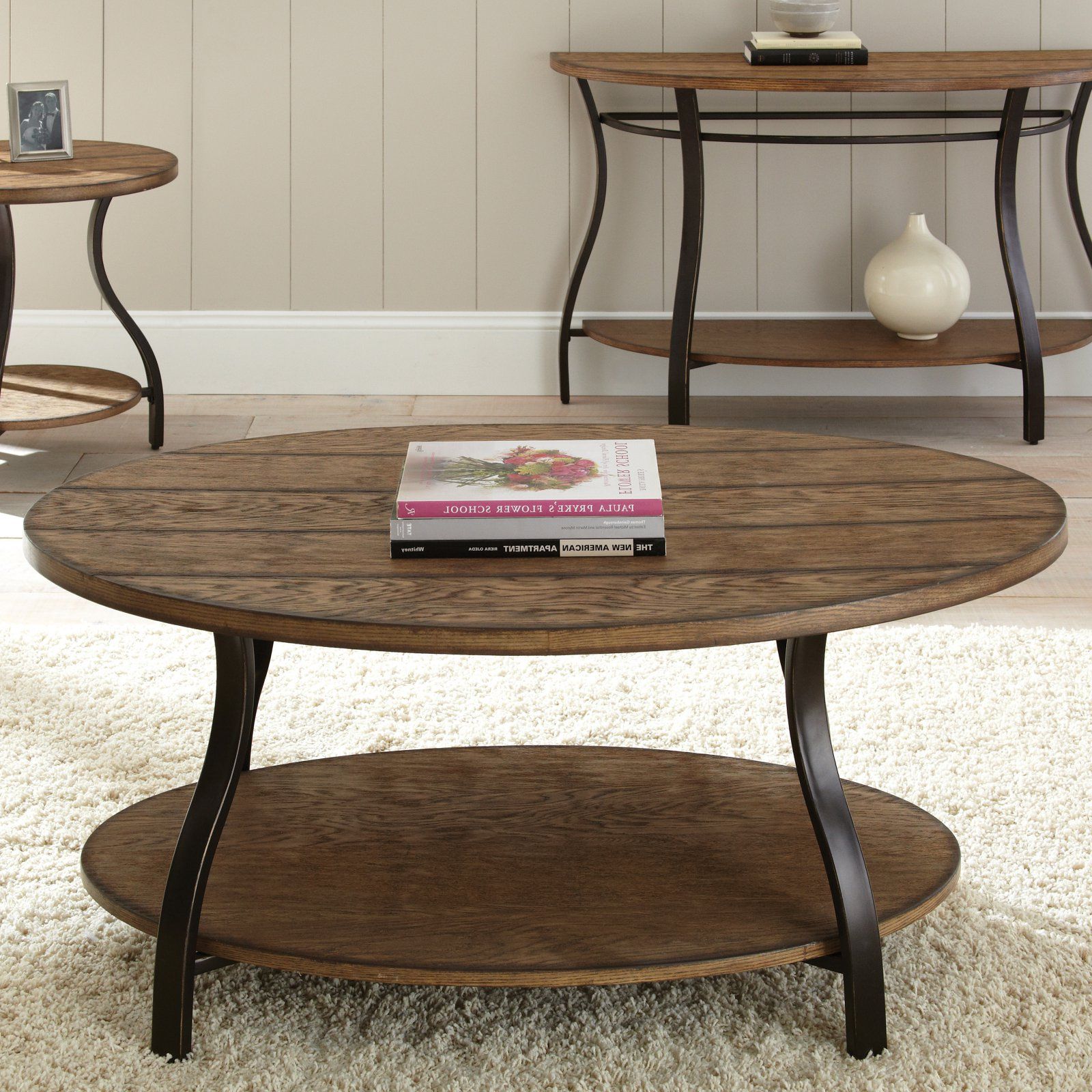 Steve Silver Denise Oval Light Oak Wood Coffee Table For Latest Silver Coffee Tables (View 1 of 20)