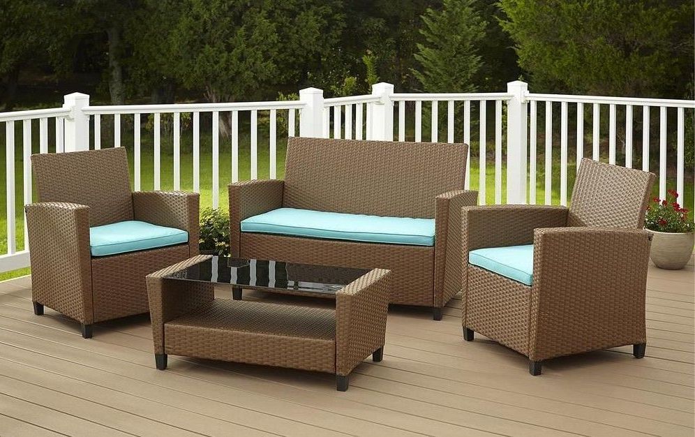 Blue And Brown Wicker Outdoor Patio Sets Pertaining To Most Popular 4 Piece Brown Resin Wicker Patio Conversation Set With Blue Cushions (View 4 of 15)