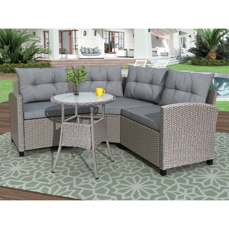 Latitude Run® 4 Piece Resin Wicker Patio Furniture Set With Round Table With Regard To Latest 4 Piece Outdoor Wicker Seating Sets (View 3 of 15)