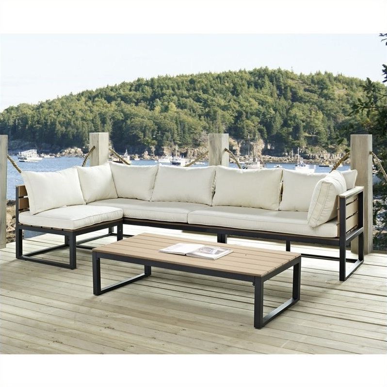 Popular Black Cushion Patio Conversation Sets Throughout 4 Piece Outdoor Conversation Set With Cushions In Natural And Black (View 9 of 15)