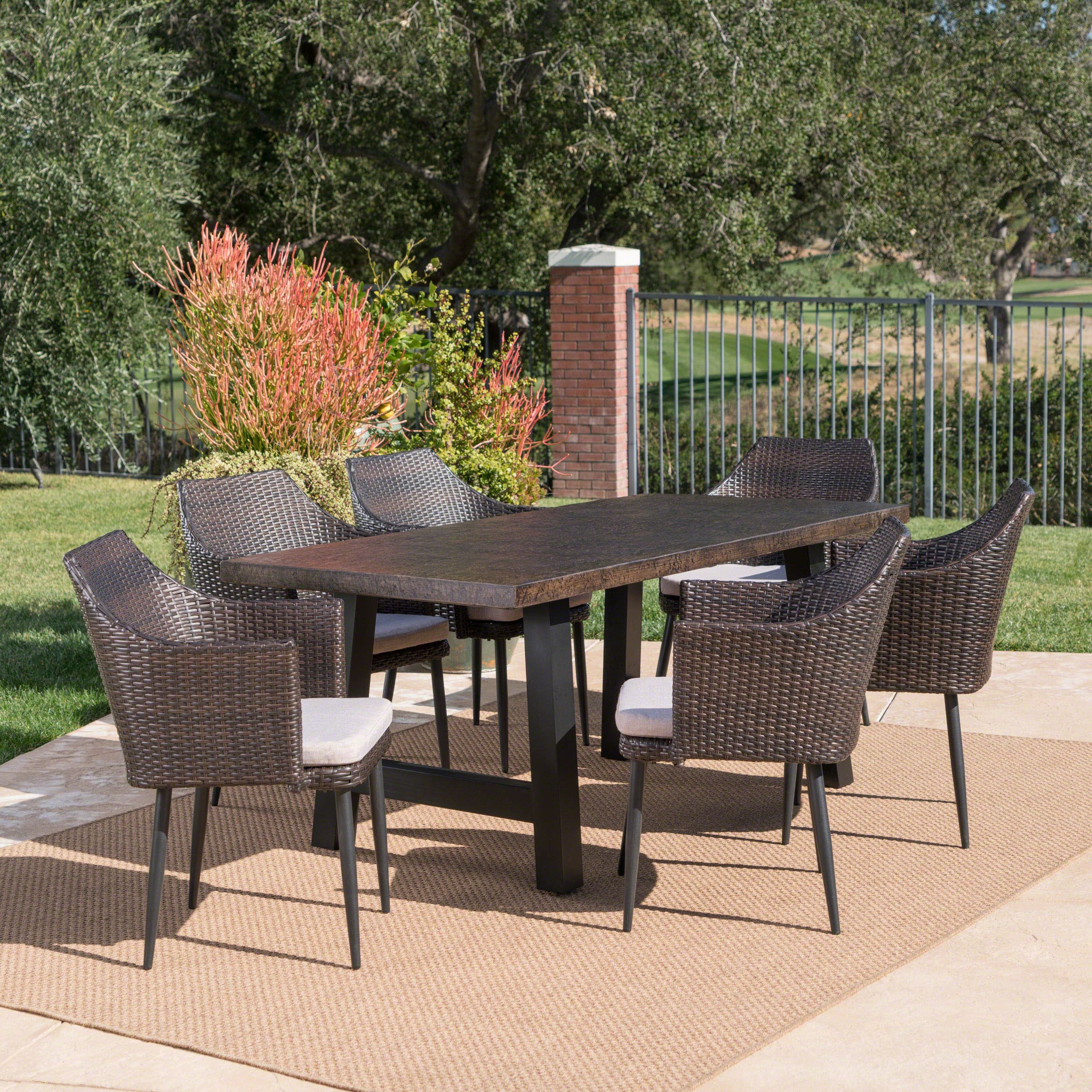 Porter Outdoor 7 Piece Wicker Dining Set With Light Weight Concrete Inside Favorite Rattan Wicker Outdoor Seating Sets (View 9 of 15)