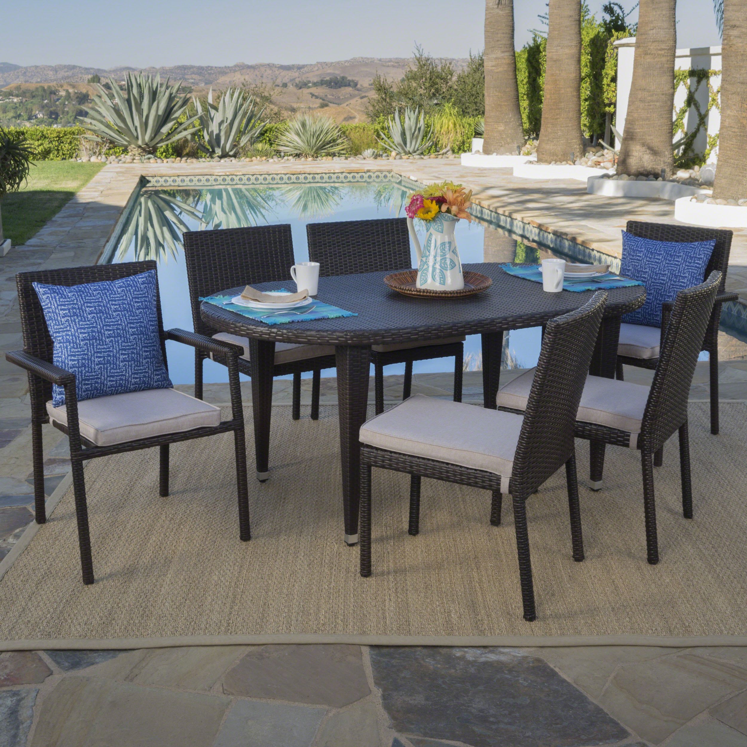 Pratt Outdoor 7 Piece Wicker Oval Dining Set With Armed And Armless Within Most Recent Oval 7 Piece Outdoor Patio Dining Sets (View 3 of 15)