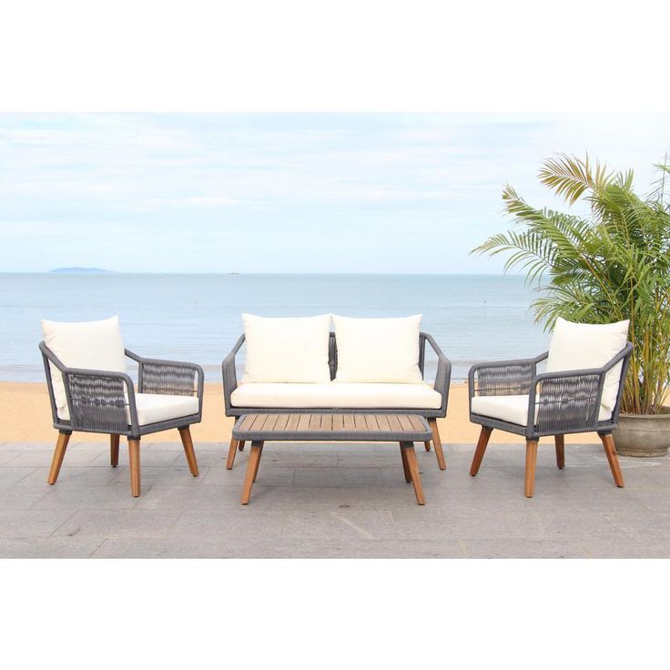Safavieh Raldin Grey 4 Piece Wood Patio Conversation Set With White Within Well Liked Gray Wood Outdoor Conversation Sets (View 4 of 15)