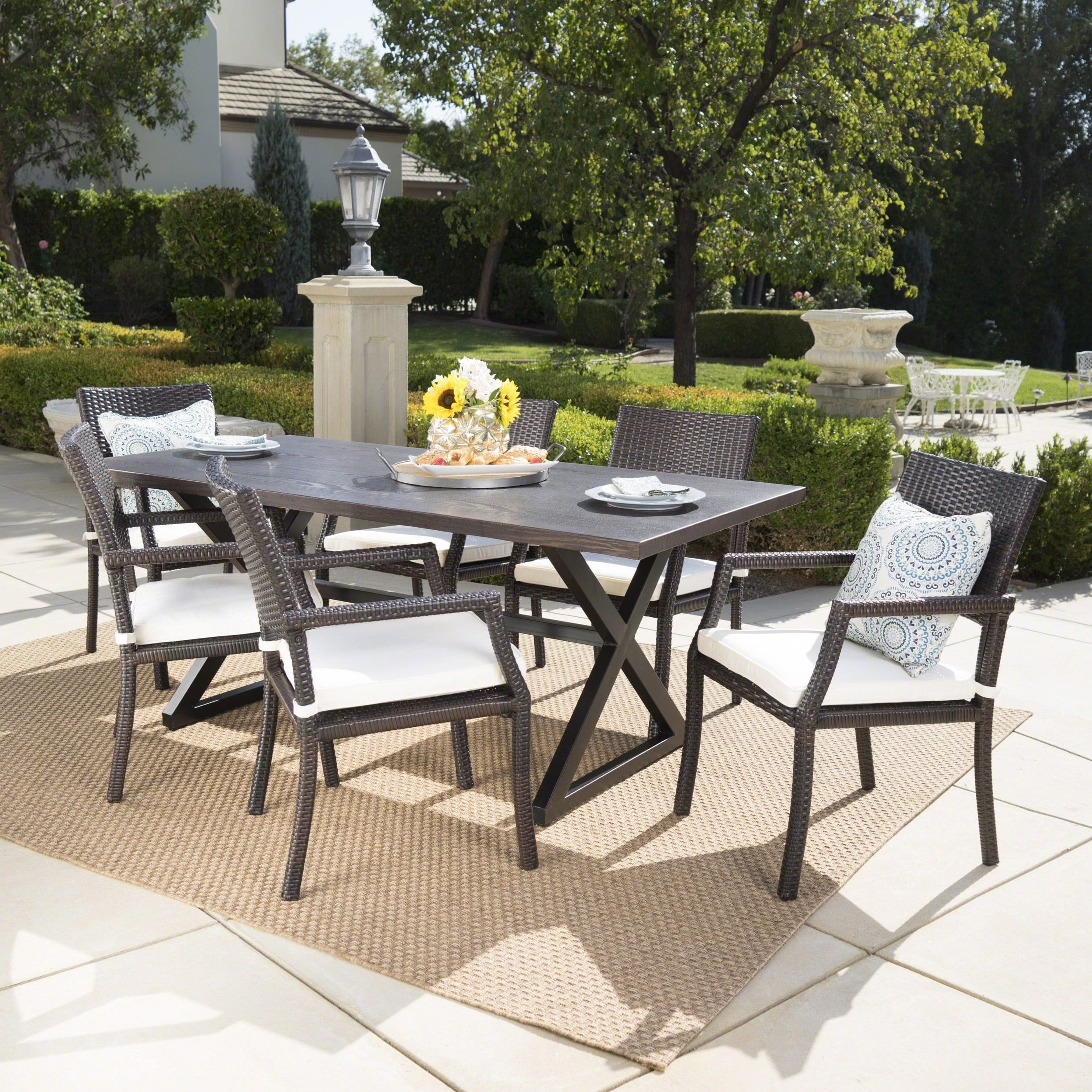 Trendy Brown Wicker Rectangular Patio Dining Sets Throughout Alani Outdoor 7 Piece Rectangular Wicker Aluminum Dining Set Brown N/a (View 1 of 15)