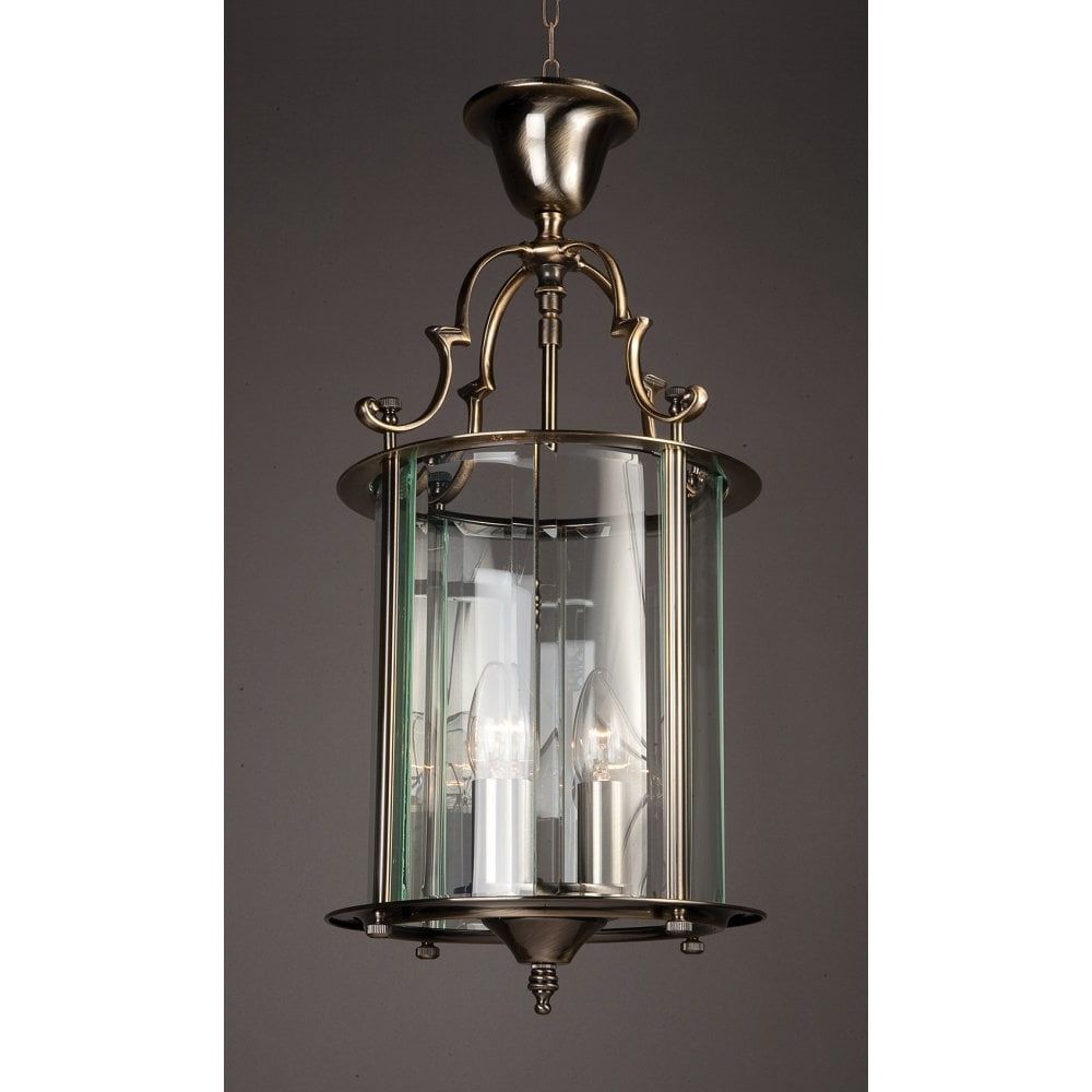 Aged Brass Lantern Chandeliers Intended For Fashionable Impex Lighting Lg07000/09/ab Colchester 3 Light Ceiling Lantern Pendant In Antique  Brass Finish N22620 – Indoor Lighting From Castlegate Lights Uk (View 15 of 15)