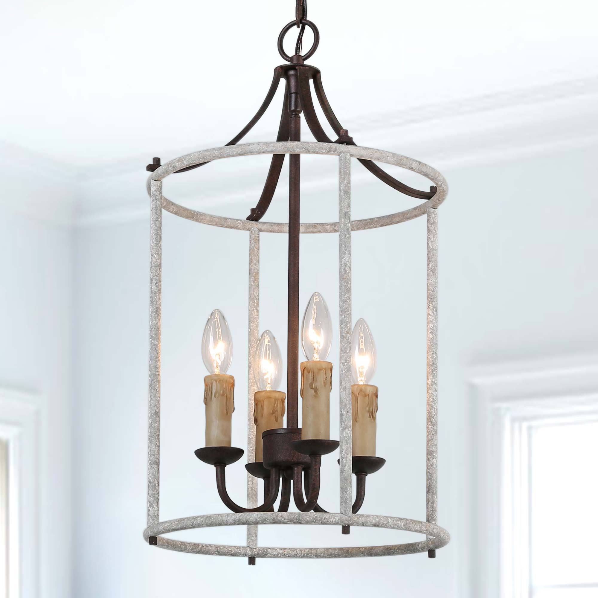 Deco Polished Nickel Lantern Chandeliers In Widely Used New World Decor Ribbon 4 Light Distressed Gray And Bronze Coastal Cage  Chandelier In The Chandeliers Department At Lowes (View 9 of 15)