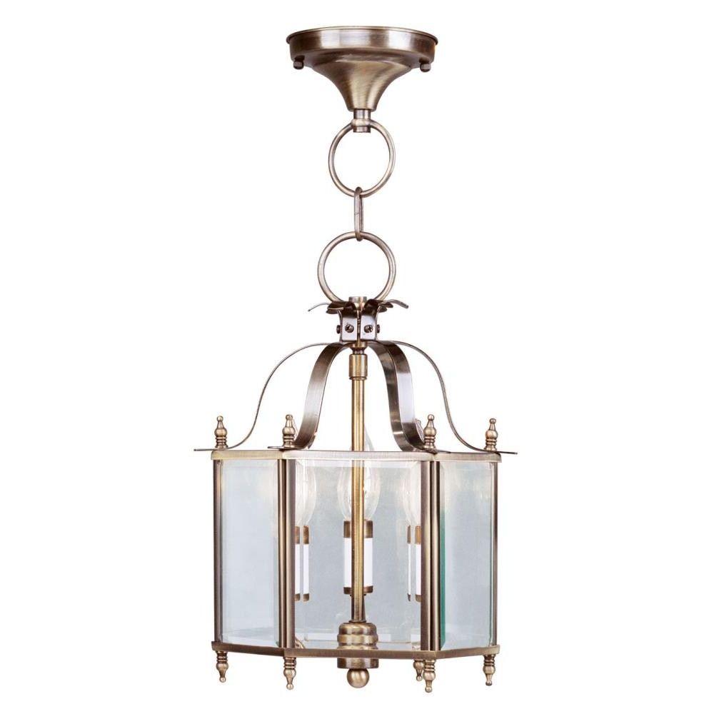 Fashionable Clear Glass Shade Lantern Chandeliers Throughout Livex Lighting Livingston 3 Light Antique Brass Traditional Clear Glass  Lantern Pendant Light In The Pendant Lighting Department At Lowes (View 12 of 15)