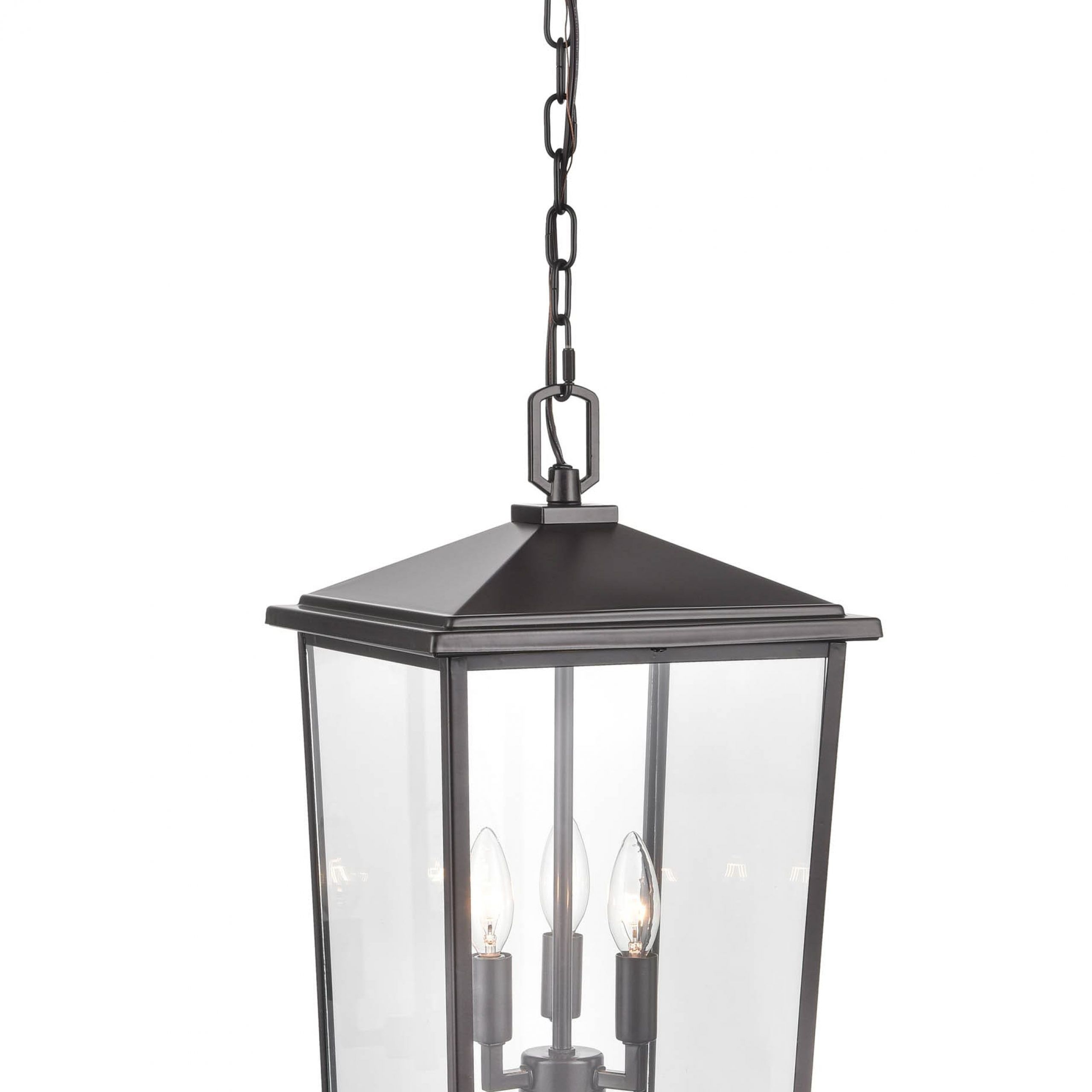 Most Up To Date Millennium Lighting Fetterton 3 Light Powder Coat Bronze Transitional Clear  Glass Lantern Outdoor Pendant Light In The Pendant Lighting Department At  Lowes Inside Transparent Glass Lantern Chandeliers (View 11 of 15)