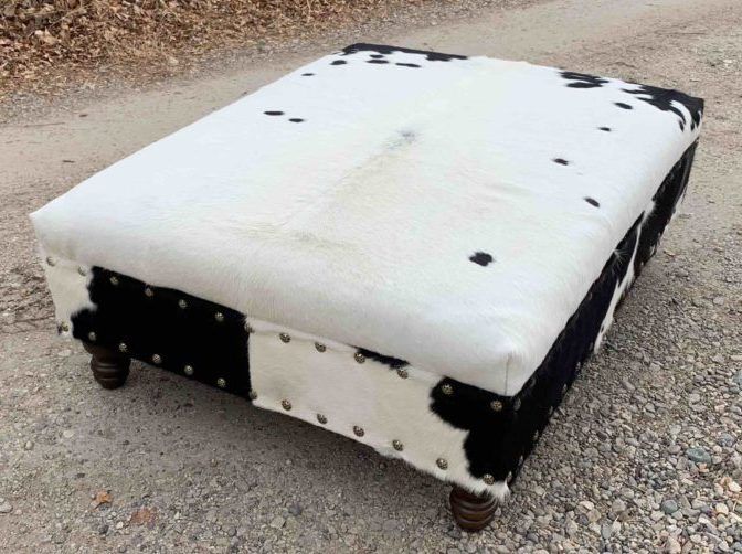 2019 White Cow Hide Ottomans Pertaining To Black And White Cowhide Ottoman Table – Rustic Artistry (View 8 of 15)