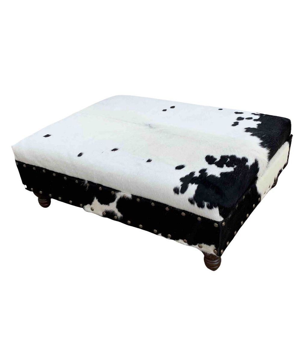 2020 Black And White Cowhide Ottoman Table – Rustic Artistry Pertaining To White Cow Hide Ottomans (View 6 of 15)