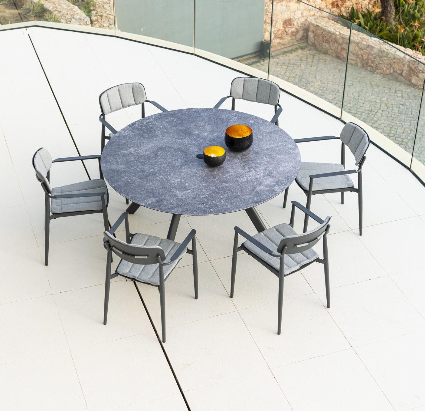 Metal Table Patio Furniture Throughout Best And Newest Circular Modern Metal Garden Dining Table With Either 6 Side Chairs Or  Armed Dining Chairs. (Photo 8 of 15)